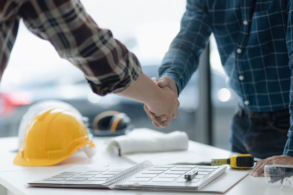 iConstruct Home Investors Handshake