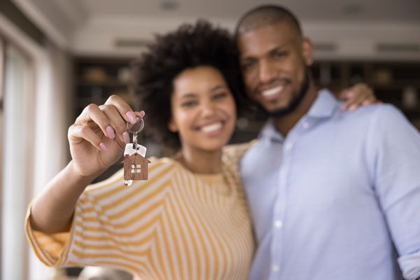 iConstruct Couple With House Keys